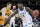 Duke forward Zion Williamson (1) drives against North Dakota State forward Rocky Kreuser, left, during the first half of a first-round game in the NCAA men’s college basketball tournament Friday, March 22, 2019, in Columbia, S.C. (AP Photo/Sean Rayford)