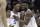 Duke's Zion Williamson, right, embraces RJ Barrett, left, during the second half of the NCAA college basketball championship game against Florida State in the Atlantic Coast Conference tournament in Charlotte, N.C., Saturday, March 16, 2019. (AP Photo/Nell Redmond)