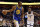 Golden State Warriors forward Kevin Durant (35) handles the ball against Memphis Grizzlies forward Justin Holiday (7) during the second half of an NBA basketball game Wednesday, March 27, 2019, in Memphis, Tenn. (AP Photo/Brandon Dill)