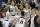 Iowa players including Megan Gustafson (10) and Hannah Stewart (21) celebrates in the closing seconds of the second half of a regional women's college basketball game against North Carolina State in the NCAA Tournament in Greensboro, N.C., Saturday, March 30, 2019. (AP Photo/Chuck Burton)