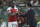 Arsenal manager Unai Emery congratulates Danny Welbeck who scored his side's first goal after substituting him during the Europa League group E soccer match between Sporting CP and Arsenal at the Alvalade stadium in Lisbon, Thursday, Oct. 25, 2018. (AP Photo/Armando Franca)