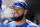 Chicago Cubs' David Bote stands in the dugout during a spring training baseball game Sunday, March 24, 2019, in Peoria, Ariz. (AP Photo/Elaine Thompson)