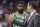 Boston Celtics guard Kyrie Irving and head coach Brad Stevens talk during the second half of an NBA basketball game against the Washington Wizards, Wednesday, Dec. 12, 2018, in Washington. The Celtics won 130-125 in overtime. (AP Photo/Alex Brandon)