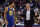 Golden State Warriors coach Steve Kerr, right, talks with guard Shaun Livingston during the second half of the team's NBA basketball game against the Memphis Grizzlies on Wednesday, March 27, 2019, in Memphis, Tenn. (AP Photo/Brandon Dill)