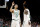 Boston Celtics' Jayson Tatum high fives with Kyrie Irving during the second quarter of an NBA basketball game against the Indiana Pacers Friday, March 29, 2019, in Boston. (AP Photo/Winslow Townson)