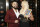 NEW YORK, NEW YORK - APRIL 05: WWE Superstars Andrade and Charlotte Flair attend the WWE Superstars For Hope Reception on April 05, 2019 in New York City. (Photo by Brian Ach/Getty Images for WWE)