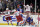 Carolina Hurricanes center Jordan Staal, top right, reacts after scoring an overtime goal on New York Islanders goaltender Robin Lehner (40), of Sweden, during Game 1 of an NHL hockey second-round playoff series, Friday, April 26, 2019, in New York. The Hurricanes won 1-0. (AP Photo/Julio Cortez)