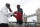 Britain's Mo Farah, right, and Kenya's Eliud Kipchoge pose for the media during a photo call for the London Marathon in London, Wednesday, April 24, 2019. Kipchoge and Farah are part of the Elite Men taking part in the 39th London Marathon which takes place Sunday April 28. (AP Photo/Alastair Grant)
