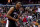 WASHINGTON, DC - MARCH 23: Thomas Bryant #13 of the Washington Wizards reacts after a play against the Miami Heat during the second half at Capital One Arena on March 23, 2019 in Washington, DC. NOTE TO USER: User expressly acknowledges and agrees that, by downloading and or using this photograph, User is consenting to the terms and conditions of the Getty Images License Agreement. (Photo by Will Newton/Getty Images)