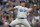 Los Angeles Dodgers starting pitcher Julio Urias works against the Colorado Rockies during the first inning of a baseball game Sunday, April 7, 2019, in Denver. (AP Photo/David Zalubowski)