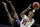 Texas Tech's Jarrett Culver (23) shoots past Buffalo's Nick Perkins (33) during the second half of a second round men's college basketball game in the NCAA Tournament Sunday, March 24, 2019, in Tulsa, Okla. Texas Tech won 78-58. (AP Photo/Charlie Riedel)