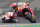 MotoGP rider Marc Marquez of Spain takes a curve followed by Jack Miller of Australia, left, during the French Motorcycle Grand Prix at the Le Mans racetrack, in Le Mans, France, Sunday, May 19, 2019. (AP Photo/David Vincent)