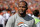 FILE - In this Sept. 29, 2013, file photo, Denver Broncos cornerback Champ Bailey watches from the sidelines during a game against the Philadelphia Eagles in Denver. Bailey isn't going to pull a Ray Lewis and inspire his team down the stretch and into the playoffs by declaring this is his last hurrah. Asked if he's thinking about retirement after his most trying season, one in which he's missed 11 games with a nagging foot injury, the Denver Broncos' 35-year-old cornerback laughed.