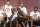 Miami Heat players laugh as they watch highlights of center Chris Bosh, right, Monday, June 24, 2013, during a celebration for season ticket holders at the American Airlines Arena in Miami. Other players from left are: Shane Battier, Juwan Howard, LeBron James, Dwyane Wade and Rashard Lewis. The Heat defeated the San Antonio Spurs 95-88 in Game 7 to win their second straight NBA championship. (AP Photo/Wilfredo Lee)