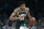 Milwaukee Bucks' Giannis Antetokounmpo brings the ball up court during the first half of Game 4 of a second round NBA basketball playoff series against the Boston Celtics in Boston, Monday, May 6, 2019. (AP Photo/Michael Dwyer)
