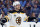 Boston Bruins defenseman Torey Krug celebrates a teammate's goal against the St. Louis Blues during the first period of Game 3 of the NHL hockey Stanley Cup Final Saturday, June 1, 2019, in St. Louis. (AP Photo/Jeff Roberson)