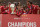 Liverpool's English midfielder Jordan Henderson (C) holds the European Champion Clubs' Cup trophy during an open-top bus parade around Liverpool, north-west England on June 2, 2019, after winning the UEFA Champions League final football match between Liverpool and Tottenham. - Liverpool's celebrations stretched long into the night after they became six-time European champions with goals from Mohamed Salah and Divock Origi to beat Tottenham -- and the party was set to move to England on Sunday where tens of thousands of fans awaited the team's return. The 2-0 win in the sweltering Metropolitano Stadium delivered a first trophy in seven years for Liverpool, and -- finally -- a first win in seven finals for coach Jurgen Klopp. (Photo by Oli SCARFF / AFP)        (Photo credit should read OLI SCARFF/AFP/Getty Images)