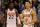 PHOENIX, AZ - NOVEMBER 08:  Devin Booker #1 of the Phoenix Suns reacts alongside Deandre Ayton #22 during the NBA game against the Boston Celtics at Talking Stick Resort Arena on November 8, 2018 in Phoenix, Arizona. The Celtics defeated the Suns 116-109 in overtime.  NOTE TO USER: User expressly acknowledges and agrees that, by downloading and or using this photograph, User is consenting to the terms and conditions of the Getty Images License Agreement.  (Photo by Christian Petersen/Getty Images)