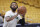 Boston Celtics forward Marcus Morris (13) shoots during warms-ups before Game 4 of an NBA basketball first-round playoff series against the Indiana Pacers in Indianapolis, Sunday, April 21, 2019. (AP Photo/Michael Conroy)