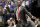 Alabama head coach Avery Johnson watches the action in the first half of an NCAA college basketball game against Kentucky at the Southeastern Conference tournament Friday, March 15, 2019, in Nashville, Tenn. (AP Photo/Mark Humphrey)