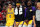 PORTLAND, OR - NOVEMBER 03:  LeBron James #23,  JaVale McGee #7 and Kyle Kuzma #0 of the Los Angeles Lakers watch the action against the Portland Trail Blazers at Moda Center on November 3, 2018 in Portland, Oregon.  NOTE TO USER: User expressly acknowledges and agrees that, by downloading and or using this photograph, User is consenting to the terms and conditions of the Getty Images License Agreement.  (Photo by Jonathan Ferrey/Getty Images)