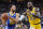 LAS VEGAS, NEVADA - OCTOBER 10:  Stephen Curry #30 of the Golden State Warriors drives against LeBron James #23 of the Los Angeles Lakers during their preseason game at T-Mobile Arena on October 10, 2018 in Las Vegas, Nevada. The Lakers defeated the Warriors 123-113. NOTE TO USER: User expressly acknowledges and agrees that, by downloading and or using this photograph, User is consenting to the terms and conditions of the Getty Images License Agreement.  (Photo by Ethan Miller/Getty Images)