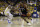 Toronto Raptors forward Kawhi Leonard (2) dribbles against Golden State Warriors forward Alfonzo McKinnie during the first half of Game 3 of basketball's NBA Finals in Oakland, Calif., Wednesday, June 5, 2019. (AP Photo/Ben Margot)