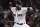 Boston Red Sox's Craig Kimbrel throws during the ninth inning of Game 2 of the World Series baseball game against the Los Angeles Dodgers Wednesday, Oct. 24, 2018, in Boston. (AP Photo/Matt Slocum)