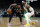 Boston Celtics' Kyrie Irving tries to look around the defense of Indiana Pacers' Wesley Matthews during the second quarter in Game 1 of a first-round NBA basketball playoff series, Sunday, April 14, 2019, in Boston. (AP Photo/Winslow Townson)