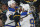 St. Louis Blues' David Perron, center, celebrates his goal against the Boston Bruins with Jay Bouwmeester, left, and Ryan O'Reilly, right, during the third period in Game 5 of the NHL hockey Stanley Cup Final, Thursday, June 6, 2019, in Boston. (AP Photo/Michael Dwyer)