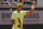 Spain's Rafael Nadal celebrates winning after Switzerland's Roger Federer's ball went out, rear left, during their semifinal match of the French Open tennis tournament at the Roland Garros stadium in Paris, Friday, June 7, 2019. (AP Photo/Michel Euler)