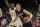 Belmont guard Dylan Windler (3) drives to the basket while being defended by Maryland guard Darryl Morsell (11) during the second half of the first round men's college basketball game in the NCAA Tournament, in Jacksonville, Fla. Thursday, March 21, 2019. (AP Photo/Stephen B. Morton)