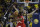 Golden State Warriors' Draymond Green, left, and Klay Thompson defend against Toronto Raptors' Kawhi Leonard, center, during the third quarter of Game 4 of basketball's NBA Finals Friday, June 7, 2019, in Oakland, Calif. (AP Photo/Ben Margot)