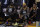 Golden State Warriors forward Draymond Green (23) sits on the bench next to center DeMarcus Cousins (0) and guard Stephen Curry (30) during the second half of Game 6 of basketball's NBA Finals against the Toronto Raptors in Oakland, Calif., Thursday, June 13, 2019. (AP Photo/Tony Avelar)