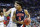 KANSAS CITY, MISSOURI - MARCH 29: Chuma Okeke #5 of the Auburn Tigers drives to the basket against Luke Maye #32 of the North Carolina Tar Heels during the 2019 NCAA Basketball Tournament Midwest Regional at Sprint Center on March 29, 2019 in Kansas City, Missouri. (Photo by Jamie Squire/Getty Images)