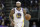 Golden State Warriors' DeMarcus Cousins (0) brings the ball up court during the second half of an NBA basketball game against the Charlotte Hornets in Charlotte, N.C., Monday, Feb. 25, 2019. (AP Photo/Chuck Burton)