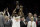 Toronto Raptors forward Kawhi Leonard, center left, celebrates after the Raptors defeated the Golden State Warriors in Game 6 of basketball's NBA Finals in Oakland, Calif., Thursday, June 13, 2019. (AP Photo/Ben Margot)