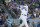 Los Angeles Dodgers' Cody Bellinger, right, watches his solo home run with Chicago Cubs catcher Willson Contreras, left, during the sixth inning of a baseball game in Los Angeles, Sunday, June 16, 2019. (AP Photo/Alex Gallardo)