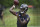 Baltimore Ravens quarterback Lamar Jackson throws a pass during NFL football practice, Thursday, May 23, 2019, in Owings Mills, MD. (AP Photo/Gail Burton)