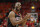 Houston Rockets guard Chris Paul (3) celebrates with his bench in the second half during an NBA basketball game against the Utah Jazz Saturday, April 20, 2019, in Salt Lake City. (AP Photo/Rick Bowmer)