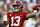 FILE - In this Oct. 13, 2018, file photo, Alabama quarterback Tua Tagovailoa (13) throws a pass during the first half of the team's NCAA college football game against Missouri in Tuscaloosa, Ala. The front-runners have clearly been established in the Heisman race, but the question now is who else can emerge with a late rush? (AP Photo/Butch Dill, File)
