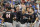 Texas Tech's Brian Klein, third from right, celebrates his solo home run against Florida State in the sixth inning of an NCAA College World Series baseball game in Omaha, Neb., Wednesday, June 19, 2019. (AP Photo/Nati Harnik)