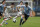 Uruguay's Luis Suarez, right, runs with the ball during a Copa America Group C soccer match against Japan at the Arena Gremio in Porto Alegre, Brazil, Thursday, June 20, 2019. (AP Photo/Silvia Izquierdo)