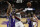 Portland Trail Blazers guard Damian Lillard, second from left, goes to the basket between Sacramento Kings' Marvin Bailey III, left, and Harry Giles III, third from left, during the second half of an NBA basketball game, Monday, Jan. 14, 2019, in Sacramento, Calif. The Kings won 115-107. (AP Photo/Rich Pedroncelli)