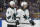 San Jose Sharks defenseman Erik Karlsson (65), of Sweden, is congratulated by Brenden Dillon (4) after Karlsson scored a goal against the St. Louis Blues during the first period in Game 3 of the NHL hockey Stanley Cup Western Conference final series Wednesday, May 15, 2019, in St. Louis. (AP Photo/Jeff Roberson)