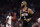 Houston Rockets' Chris Paul reacts after making a 3-point basket against the Los Angeles Clippers during the first half of an NBA basketball game Wednesday, April 3, 2019, in Los Angeles. (AP Photo/Marcio Jose Sanchez)
