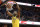 Golden State Warriors center Kevon Looney (5) dunks past Washington Wizards guard Tomas Satoransky (31) during the first half of an NBA basketball game Thursday, Jan. 24, 2019, in Washington. (AP Photo/Nick Wass)