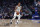 Milwaukee Bucks guard George Hill brings the ball up court during the first half of Game 4 of a first-round NBA basketball playoff series against the Detroit Pistons, Monday, April 22, 2019, in Detroit. (AP Photo/Carlos Osorio)