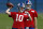 New York Giants quarterback Eli Manning passes in front of quarterback Daniel Jones during an NFL football practice Monday, May 20, 2019, in East Rutherford, N.J. (AP Photo/Adam Hunger)