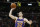 Phoenix Suns guard Jimmer Fredette (32) shoots during the first half of an NBA basketball game Monday, March 25, 2019, in Salt Lake City. (AP Photo/Rick Bowmer)